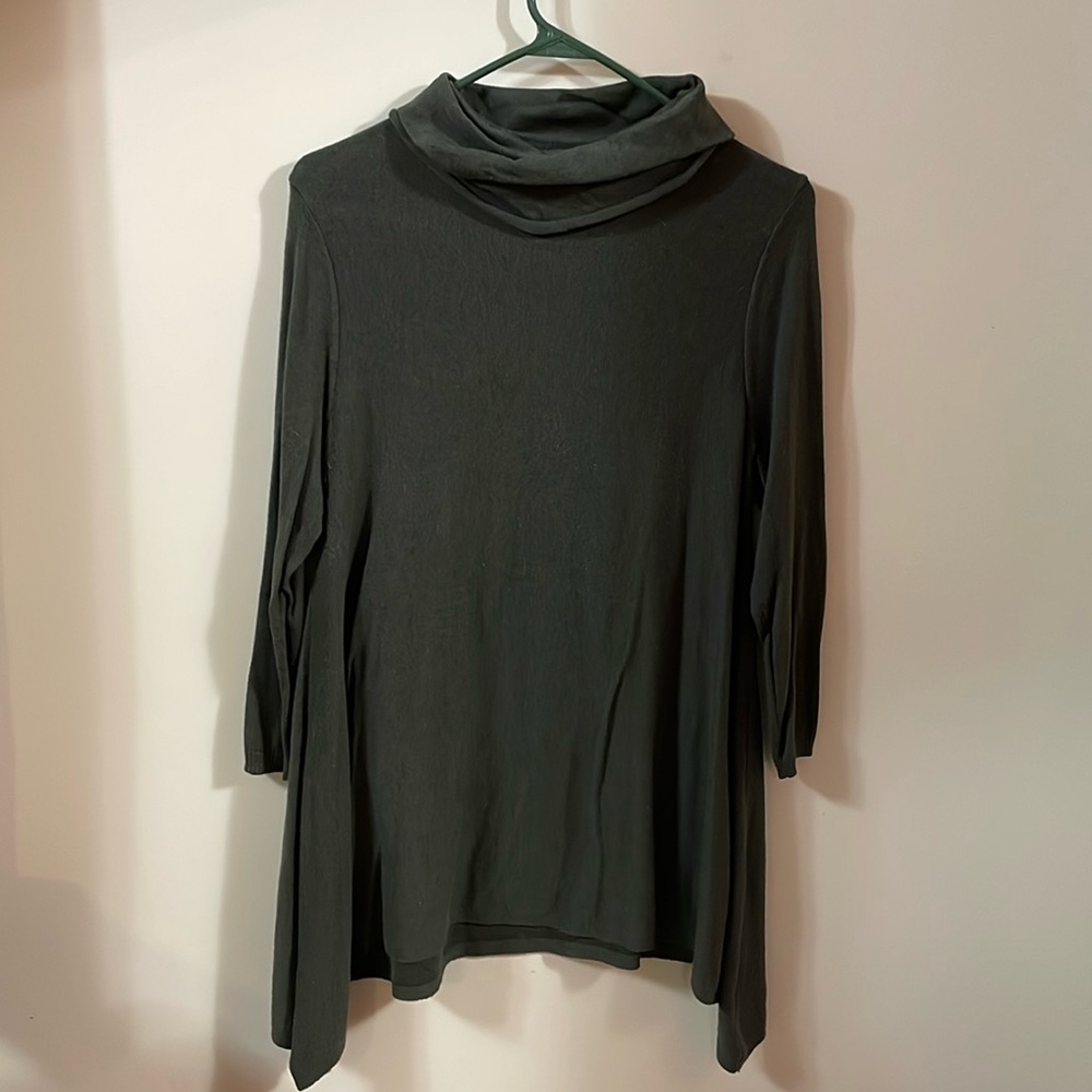 The limited 3/4 inch long sleeve sweater